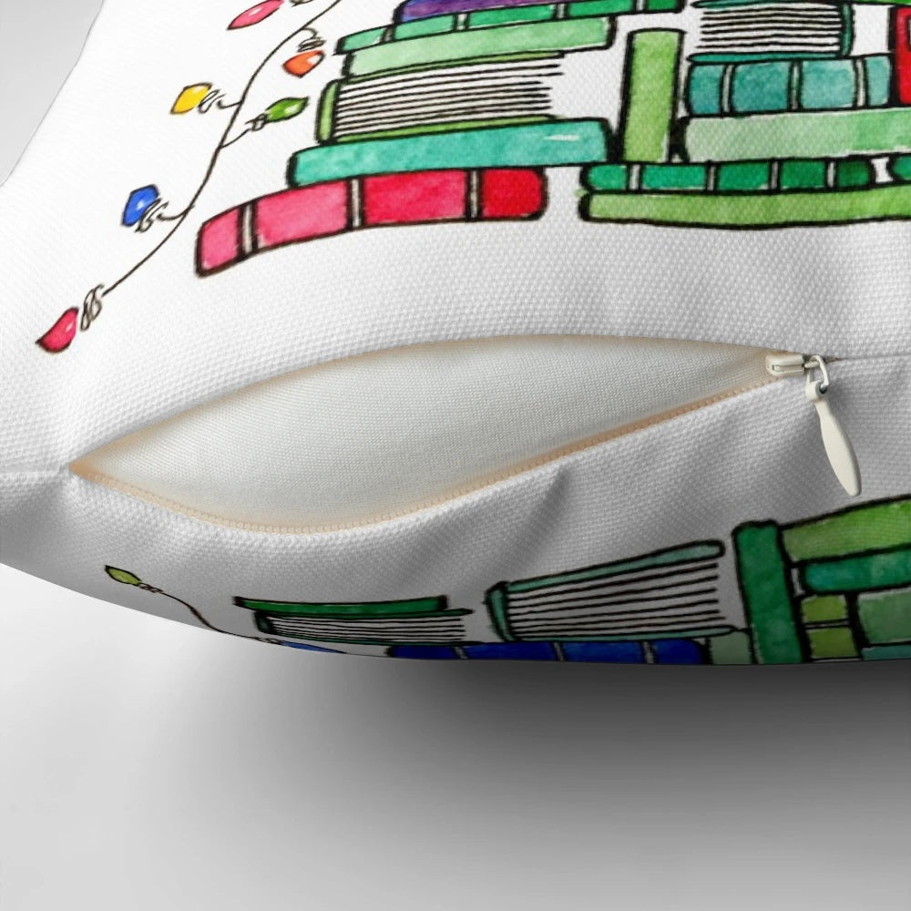 A decorative pillow featuring a stack of books arranged in the shape of a Christmas tree, perfect for book lovers during the winter holidays.