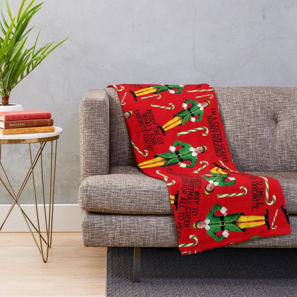 Buddy the Elf inspired plush blanket with a colorful candy cane and syrup pattern