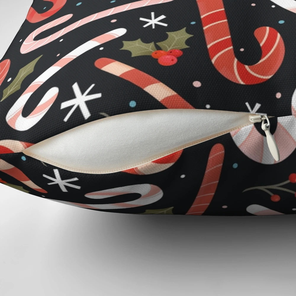 Vibrant candy cane-patterned Christmas pillow with holly and snowflake accents