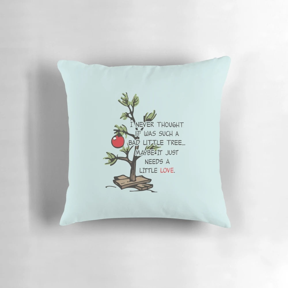 Pillow featuring the iconic Charlie Brown Christmas tree from the Peanuts franchise