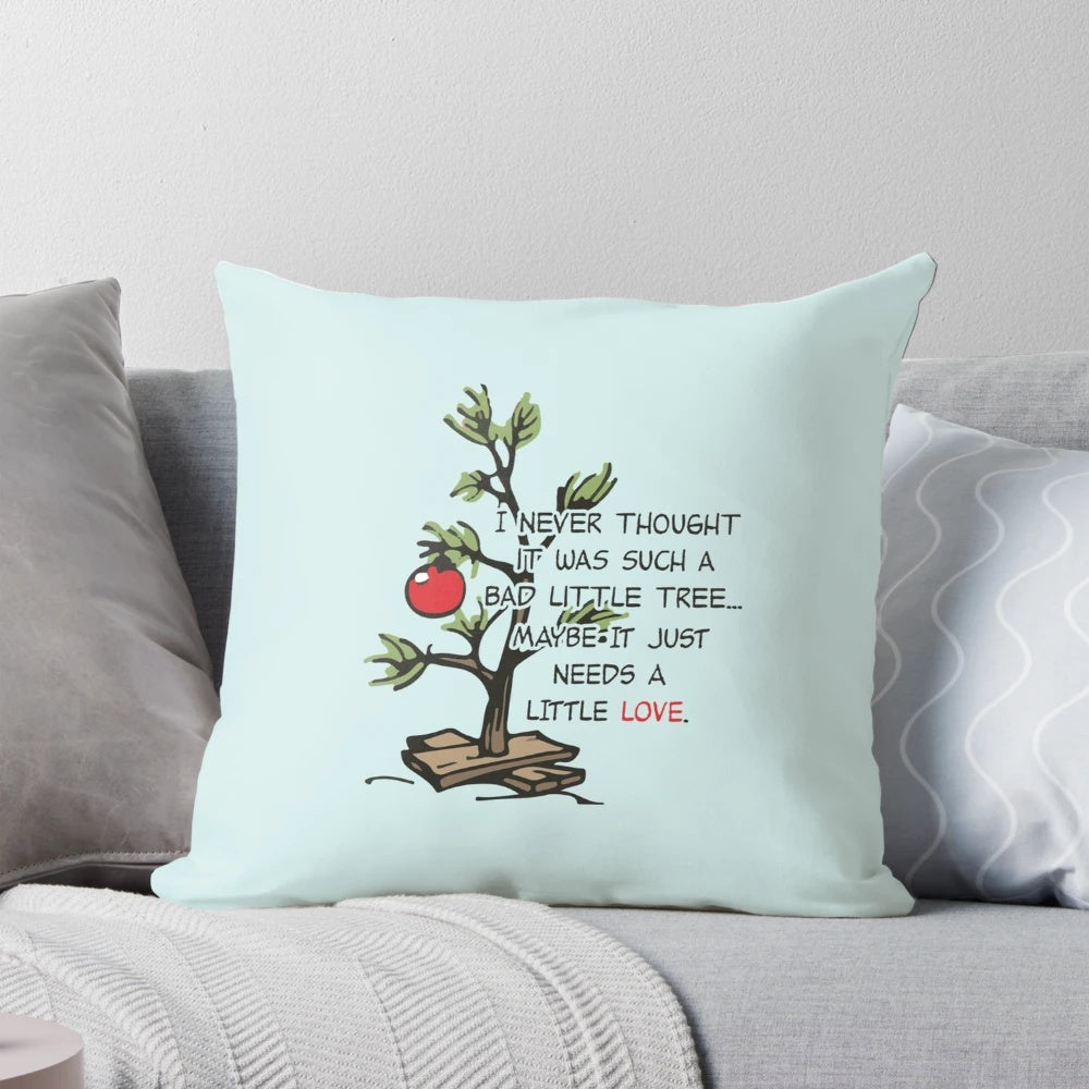 Pillow featuring the iconic Charlie Brown Christmas tree from the Peanuts franchise