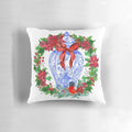 Chinoiserie-style Christmas wreath featuring a blue and white porcelain ginger jar and poinsettias