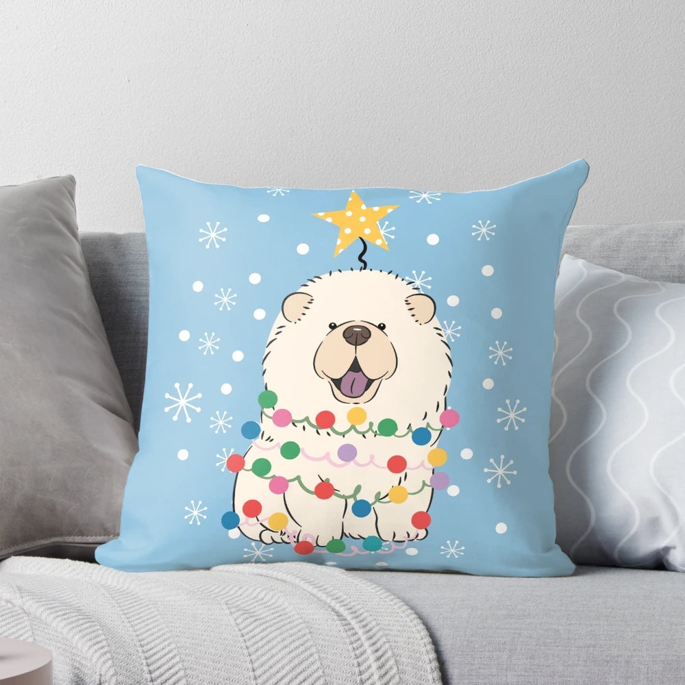 Fluffy white chow chow dog sitting on a Christmas tree-shaped pillow