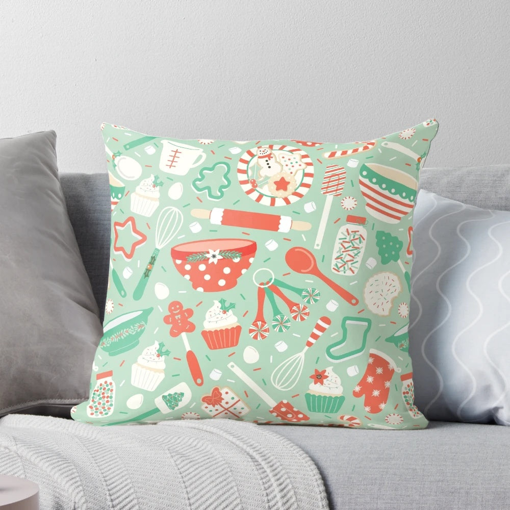 A cozy Christmas baking-themed pillow with holiday designs like cookies, candy canes, and snowflakes.