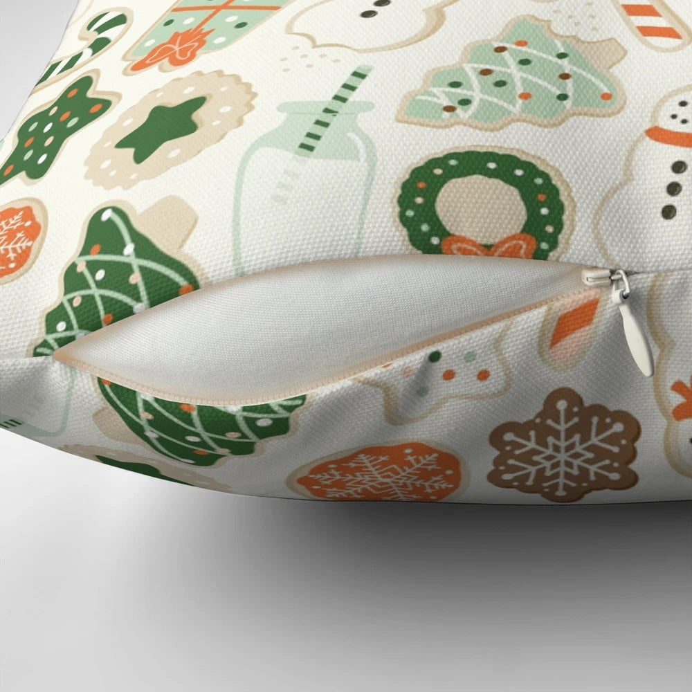 A festive Christmas cookies throw pillow featuring a colorful vector pattern of gingerbread, sprinkles, and holiday elements.