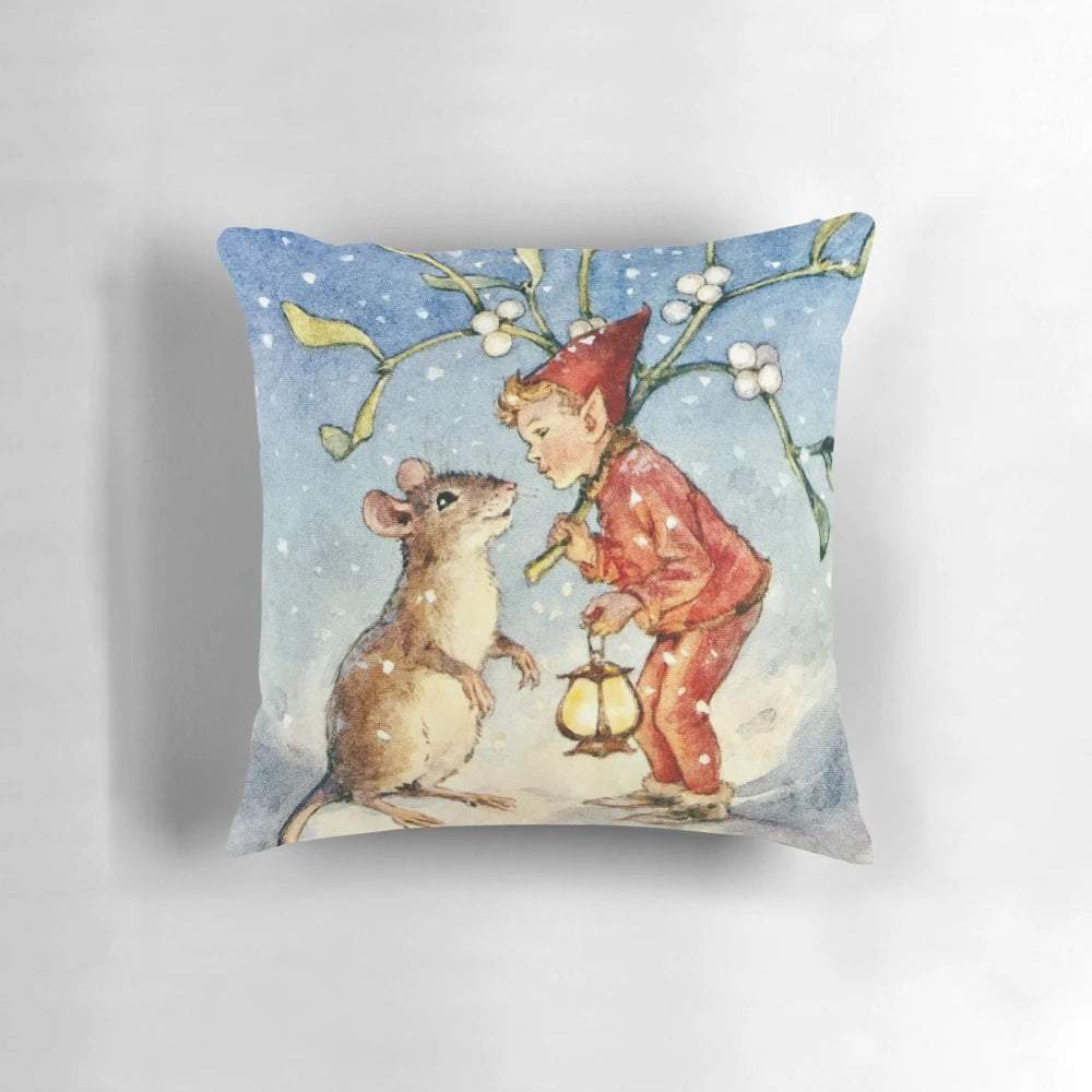 Charming Christmas pillow featuring an illustration of an elf and mouse by renowned artist Margaret Tarrant