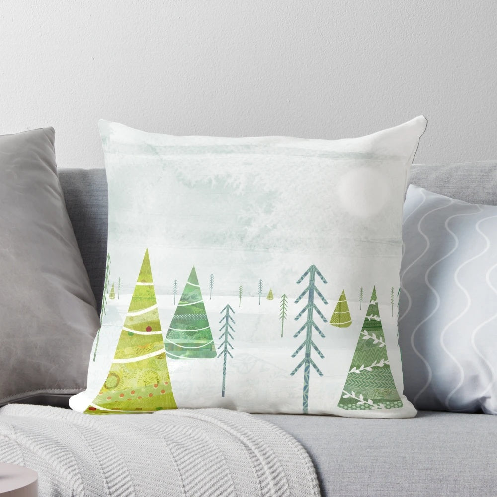 Soft, plush Christmas forest-themed throw pillow with pine trees, snow, and winter imagery