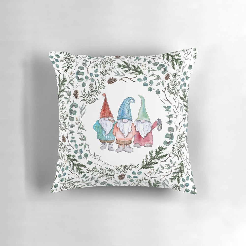 A cozy Christmas gnome pillow adorned with pine, eucalyptus, and pinecones for a festive nature-inspired look.