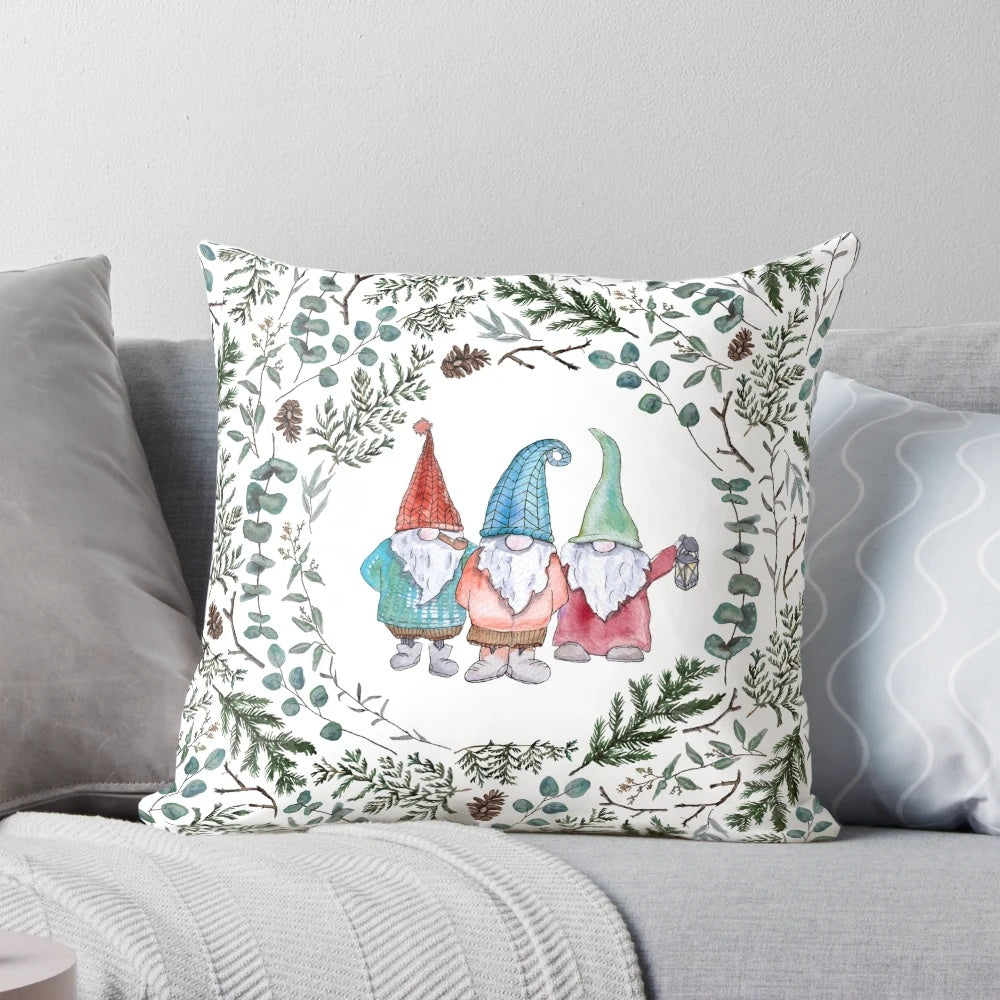 A cozy Christmas gnome pillow adorned with pine, eucalyptus, and pinecones for a festive nature-inspired look.