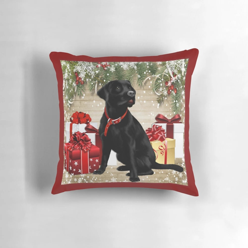 A cozy Christmas-themed throw pillow featuring a black labrador retriever dog.