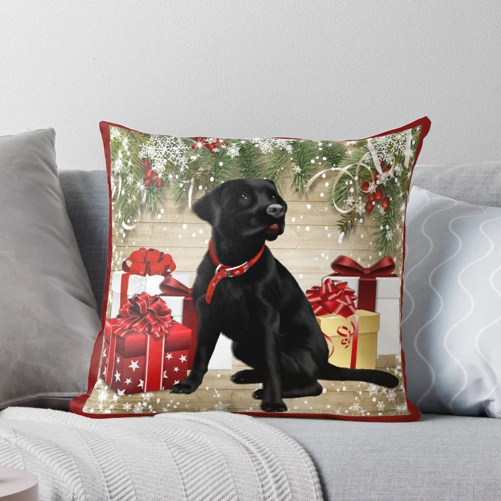 A cozy Christmas-themed throw pillow featuring a black labrador retriever dog.
