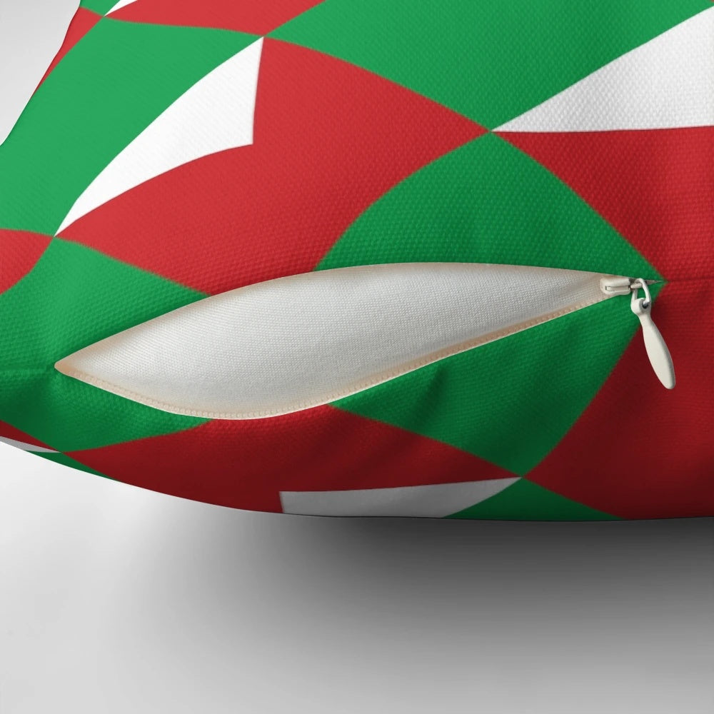 Colorful throw pillow with red, green, and white Christmas letters design
