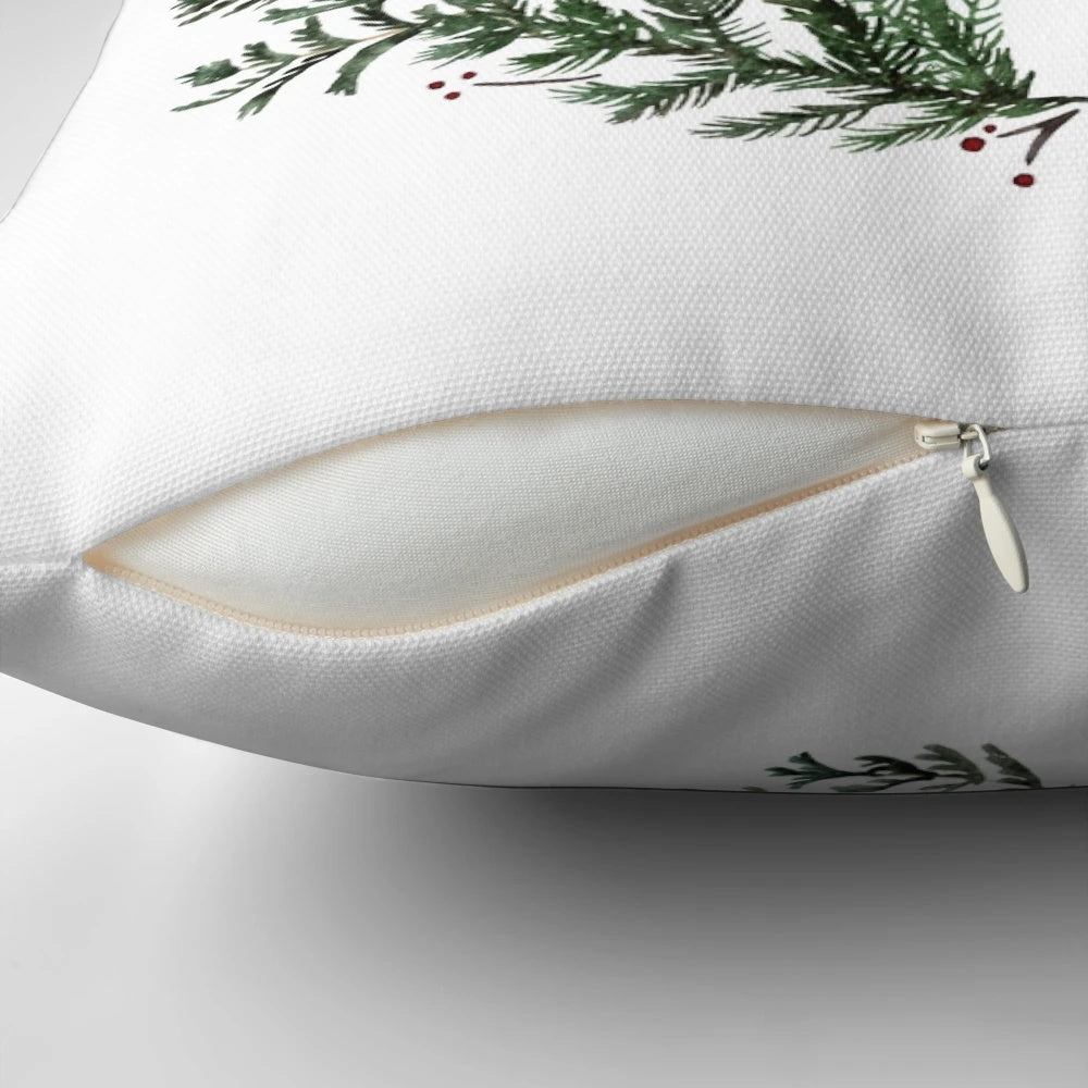 A simple, merry Christmas-themed throw pillow with a watercolor wreath design on a green background.