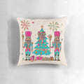 A cozy Christmas pillow featuring a nutcracker soldier and a ballerina in pink and green colors, creating a festive and whimsical holiday decoration.