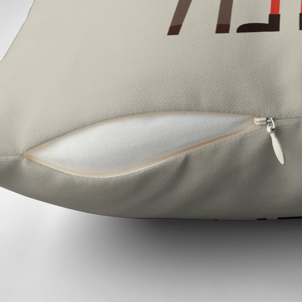 A plush Christmas pillow featuring a cartoon illustration of Santa Claus and his reindeer.