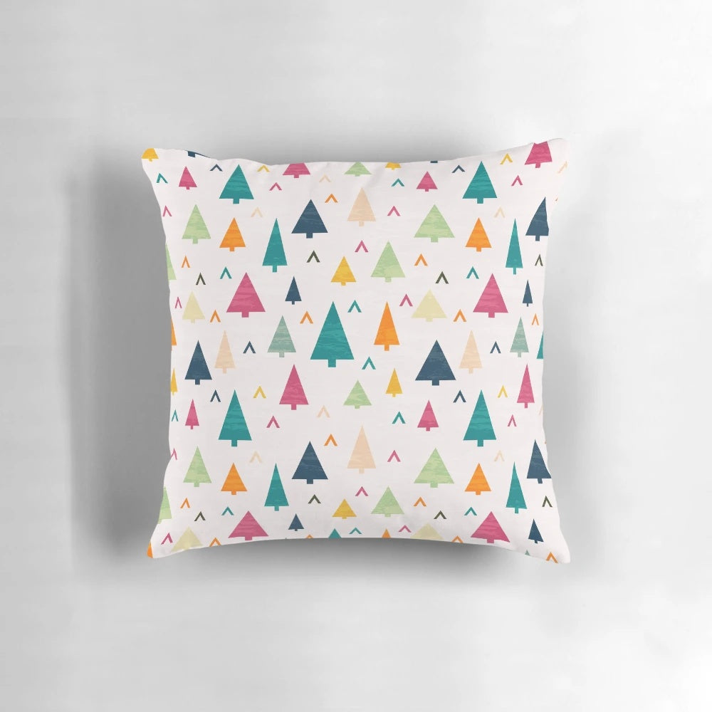 Vibrant, abstract Christmas tree design printed on a soft, plush pillow
