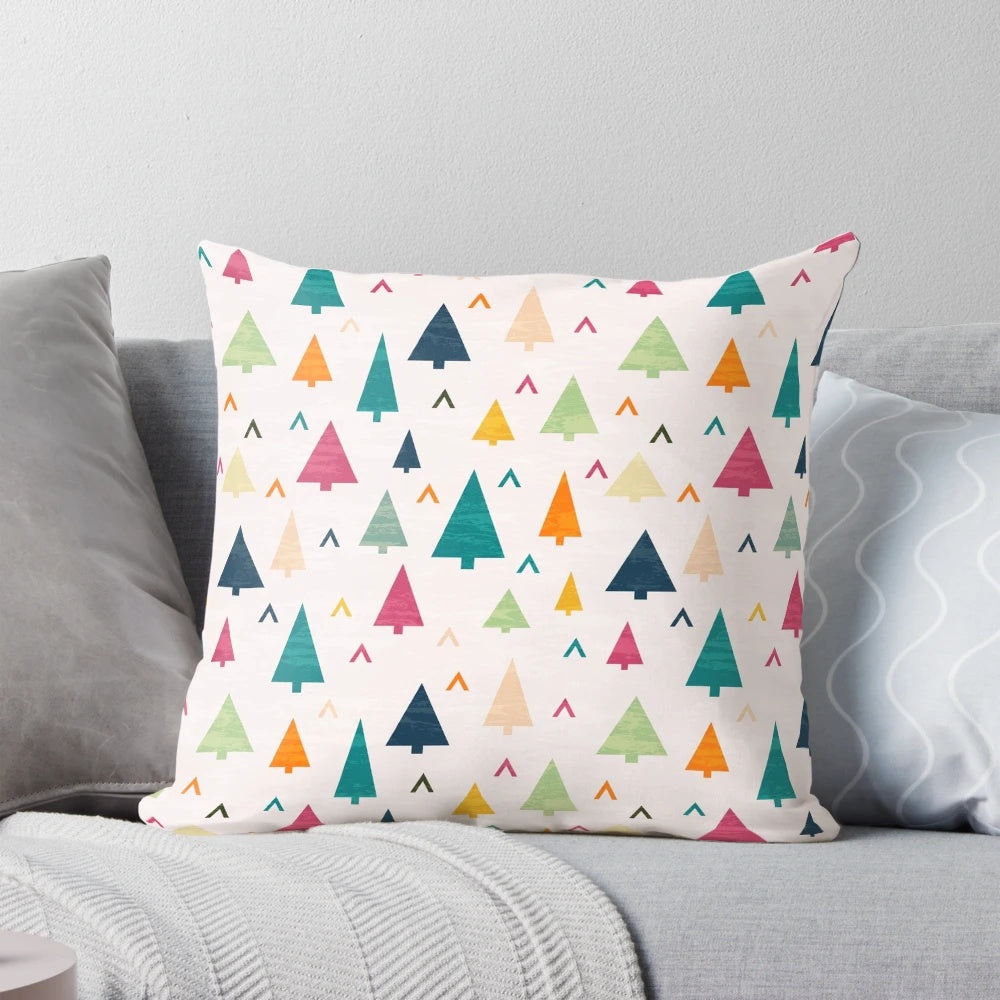 Vibrant, abstract Christmas tree design printed on a soft, plush pillow