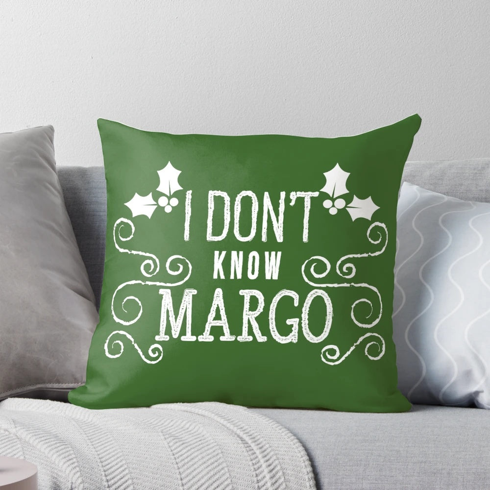 Decorative pillow featuring a quote from the movie "Christmas Vacation" with the characters Todd and Margo, designed by Kelly Design Company.