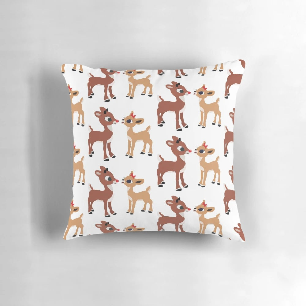 A festive classic Rudolph and Clarice pillow featuring a hand-drawn design in a Nordic, Scandinavian style.