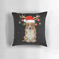 A cozy holiday pillow featuring a cute corgi dog wearing a Santa hat and surrounded by Christmas lights.