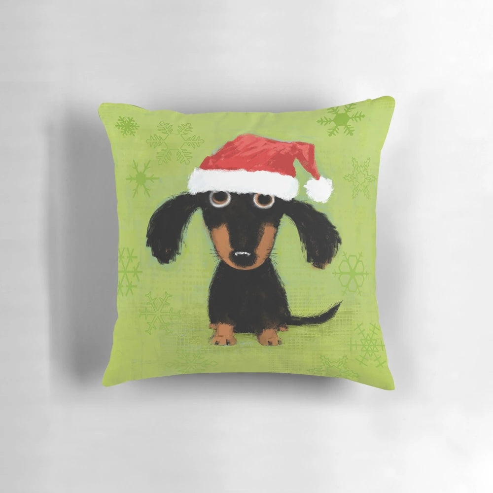 Cozy Christmas pillow featuring a dachshund dog dressed as Santa Claus