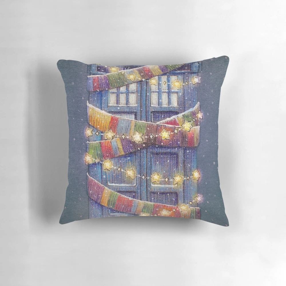 A Christmas-themed Doctor Who police box pillow