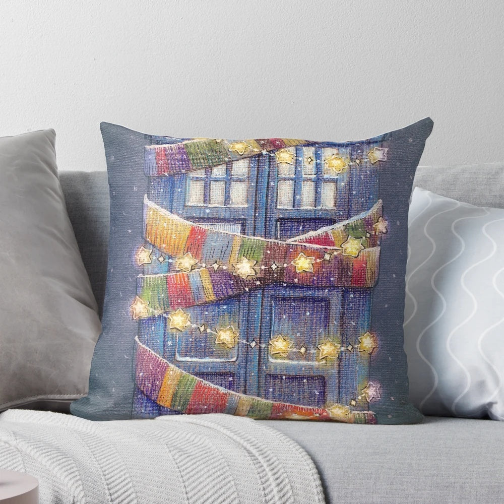 A Christmas-themed Doctor Who police box pillow
