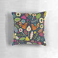 Decorative throw pillow featuring a festive floral and bird pattern in shades of indigo blue