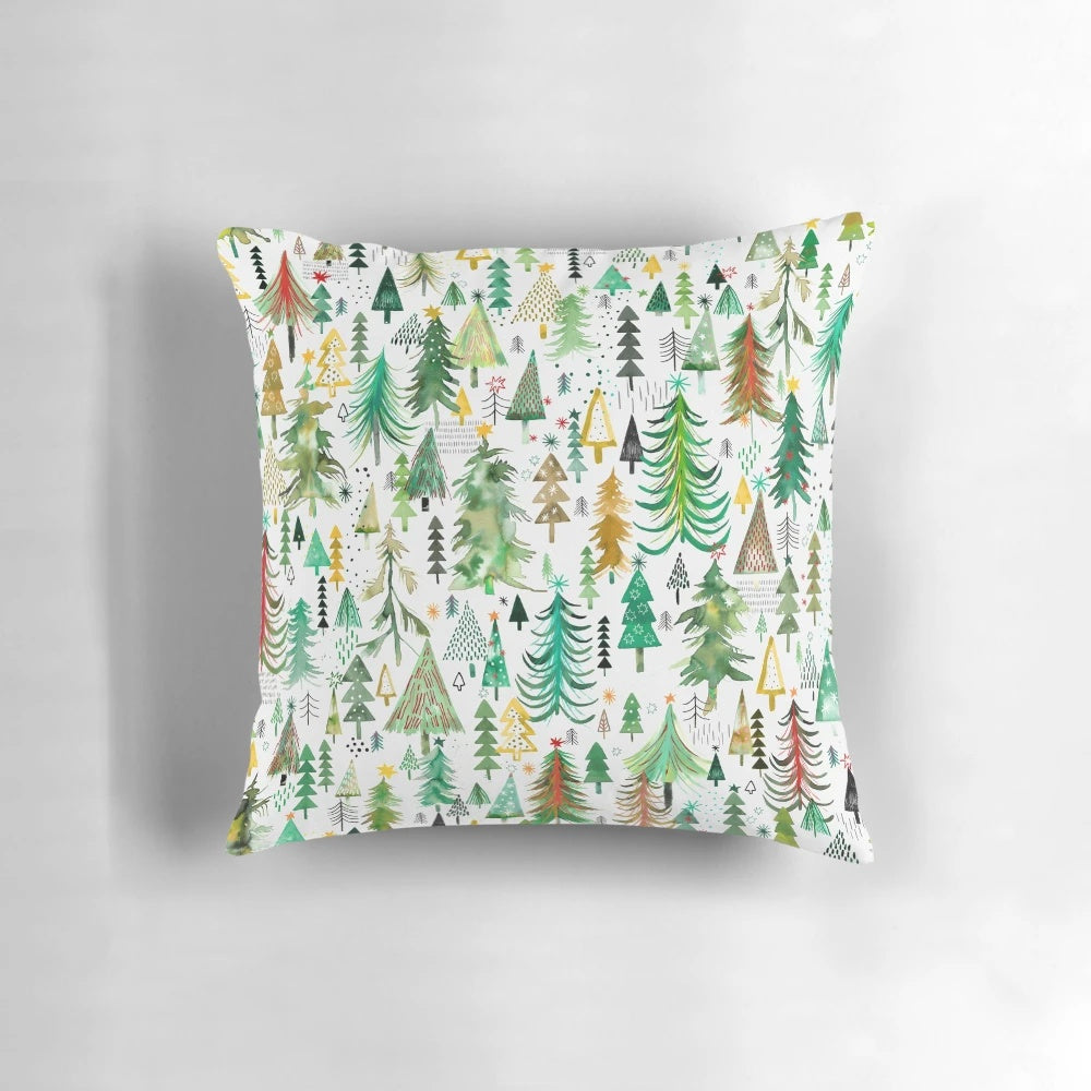 A decorative pillow featuring a beautiful watercolor pattern of pine and spruce trees in a winter forest
