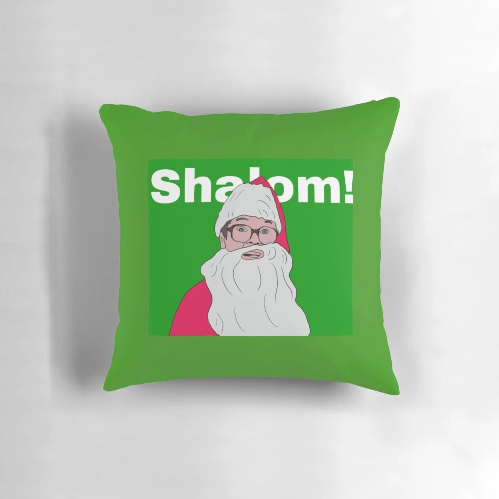 Cozy green and white Christmas-themed pillow with "Friday Night Dinner" characters