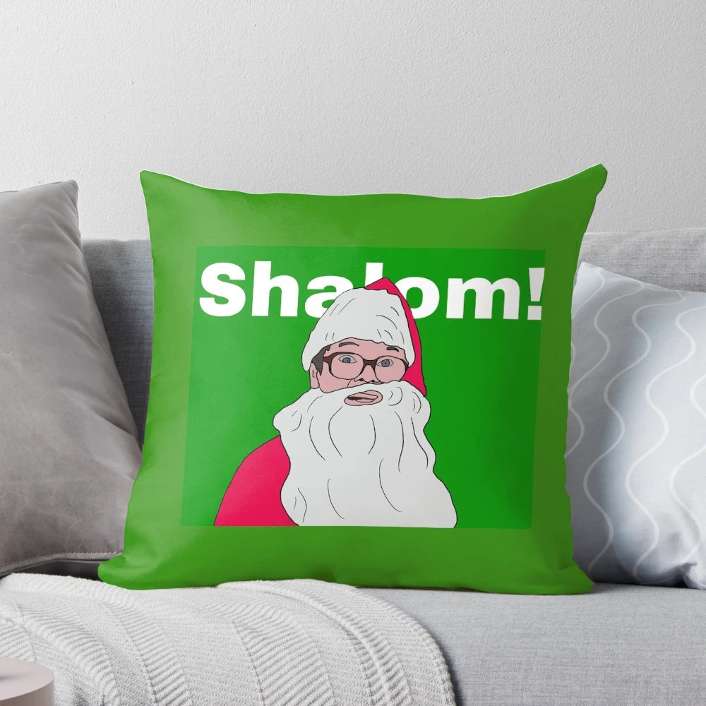 Cozy green and white Christmas-themed pillow with "Friday Night Dinner" characters