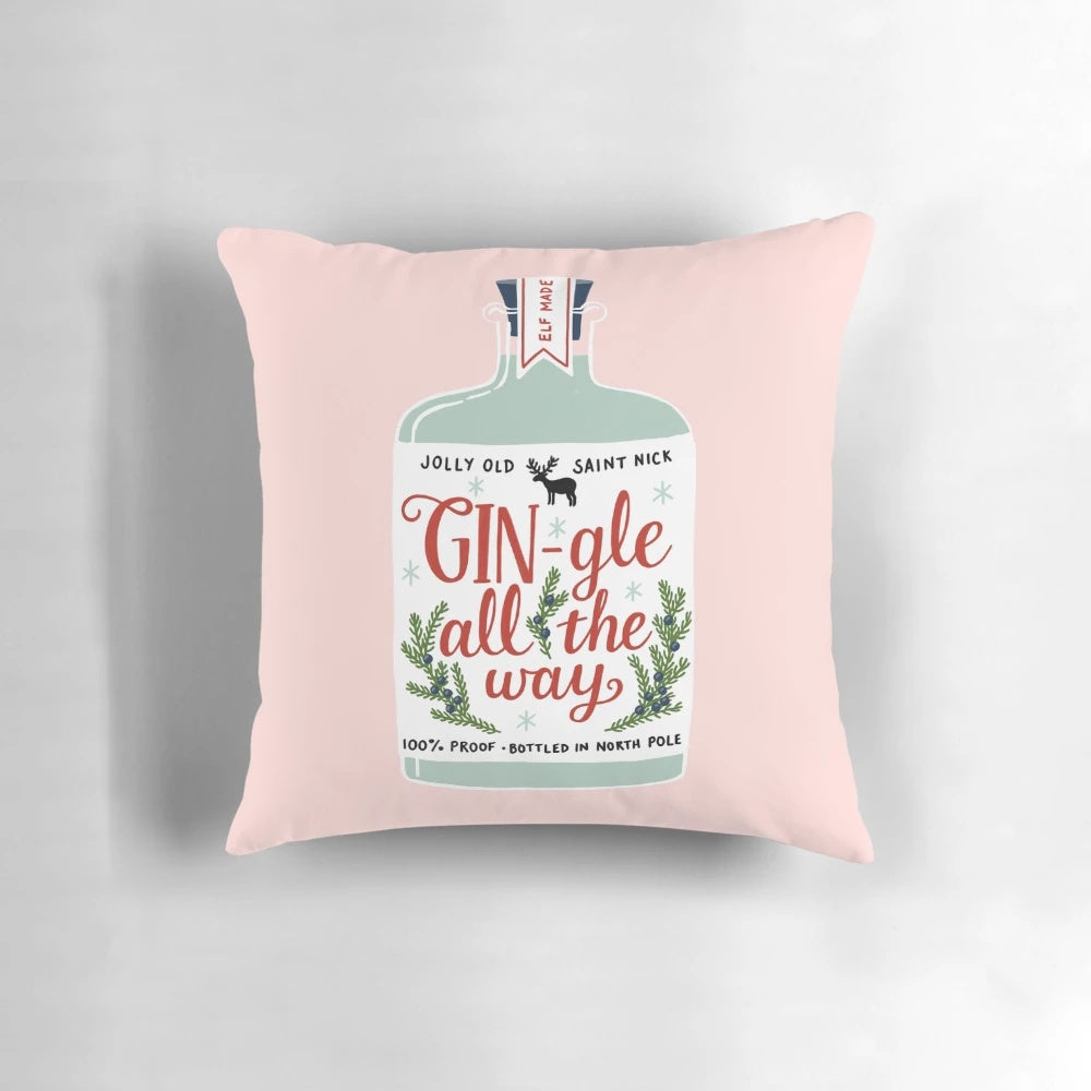 A cozy, gin-themed holiday pillow with the text "Gin-gle All The Way" printed on it.