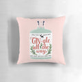 A cozy, gin-themed holiday pillow with the text "Gin-gle All The Way" printed on it.