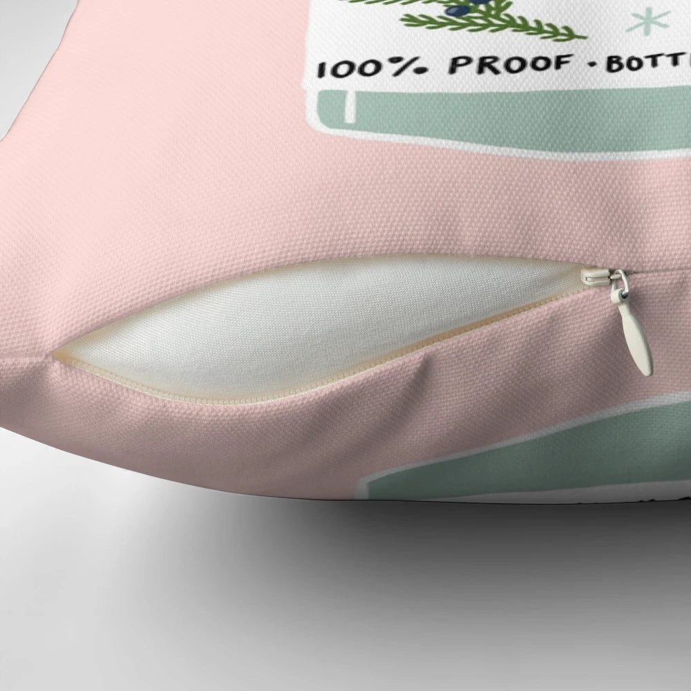A cozy, gin-themed holiday pillow with the text "Gin-gle All The Way" printed on it.