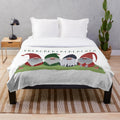 Merry Christmas gnomes plush blanket with festive holiday design