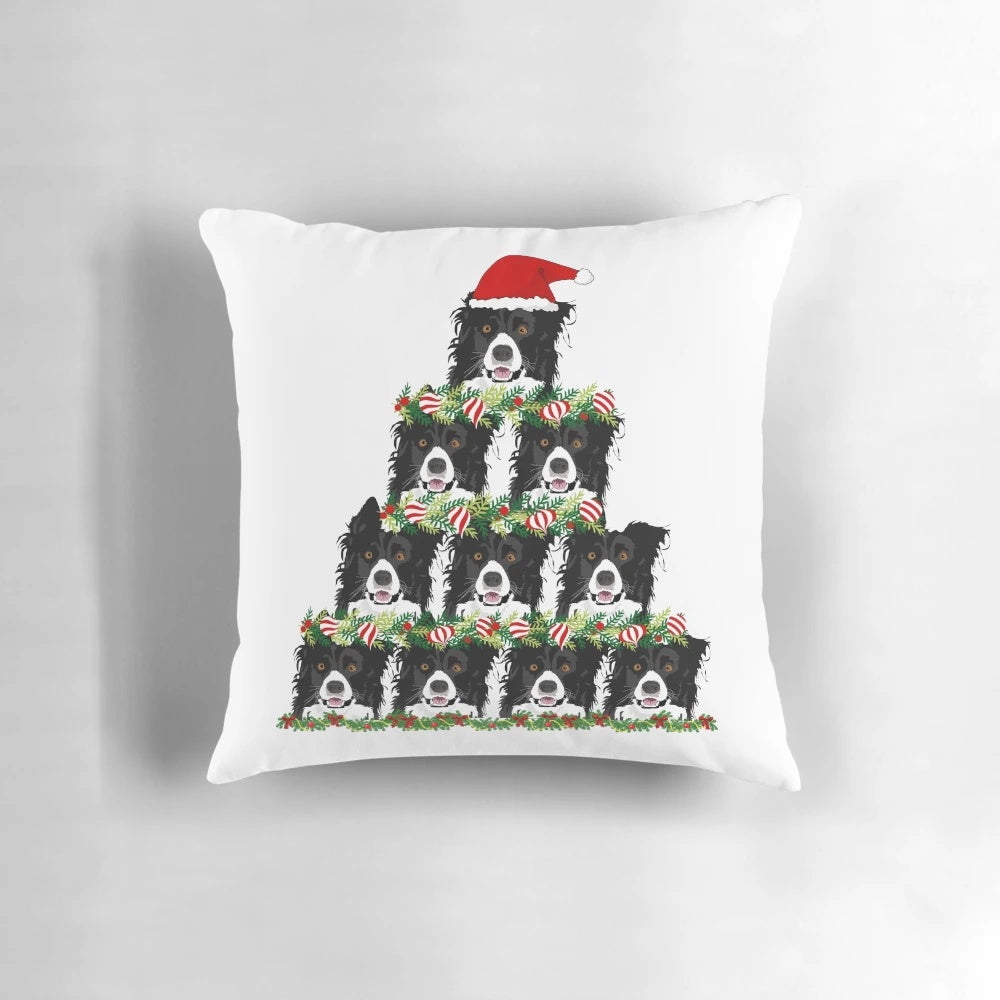 A cozy holiday throw pillow featuring a herding dog, like a border collie or Australian shepherd, wearing a Santa hat next to a Christmas tree.
