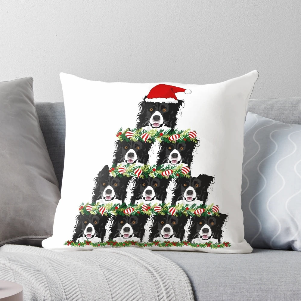 A cozy holiday throw pillow featuring a herding dog, like a border collie or Australian shepherd, wearing a Santa hat next to a Christmas tree.