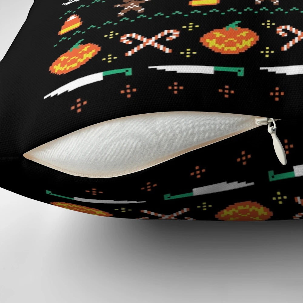 A decorative holiday pillow featuring a mix of Halloween and Christmas elements, including jack-o-lanterns, gingerbread men, and a festive knit pattern.