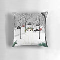 A decorative pillow featuring a snowy landscape with holly, pine, and ghostly figures.