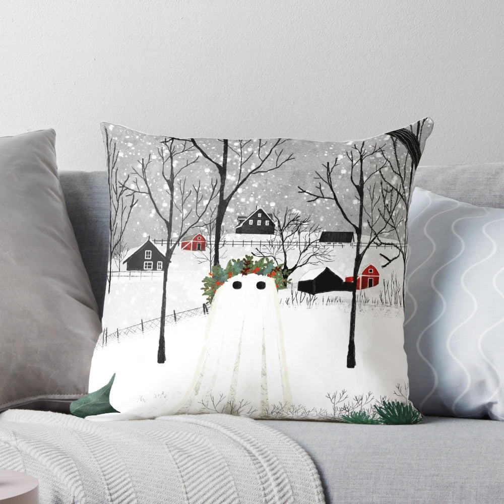 A decorative pillow featuring a snowy landscape with holly, pine, and ghostly figures.