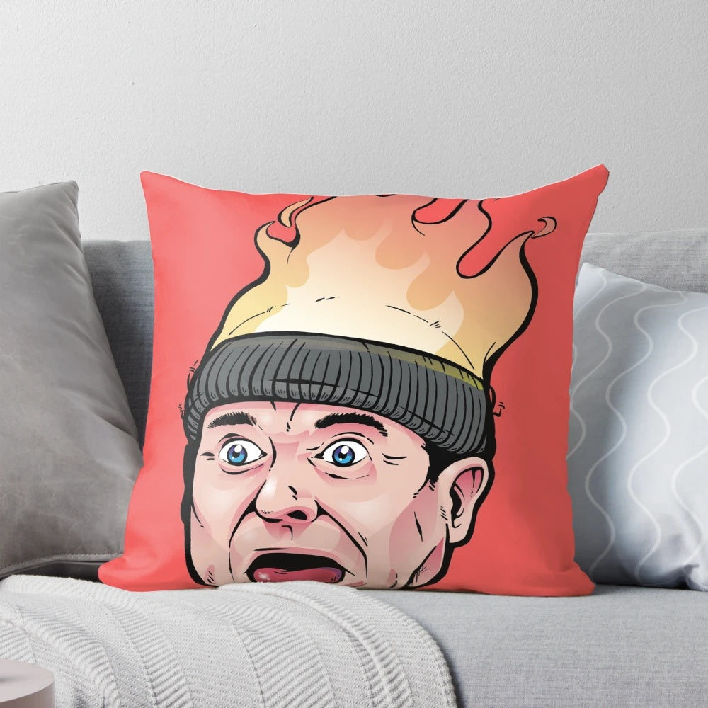 A cozy Christmas pillow featuring the iconic "Home Alone" characters and holiday theme