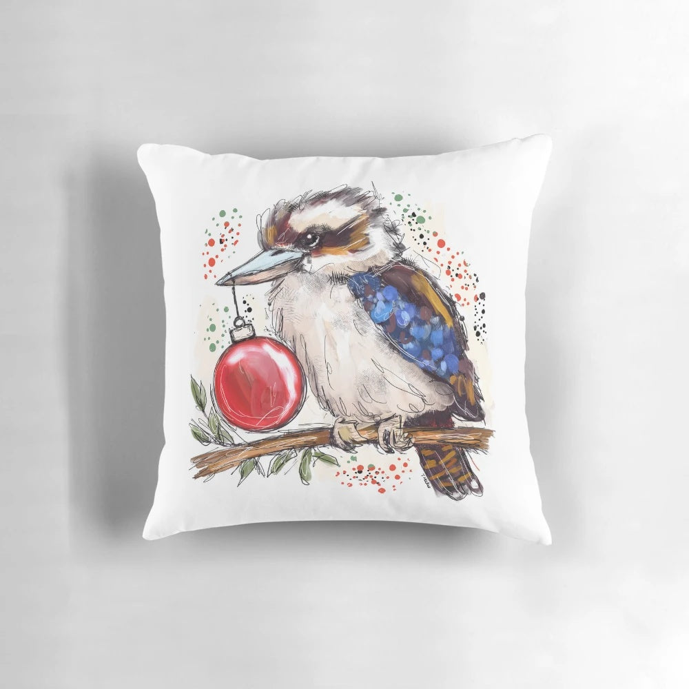 Colorful Christmas-themed pillow featuring a kookaburra, an iconic Australian native bird, designed by artist Tracey Mackie.