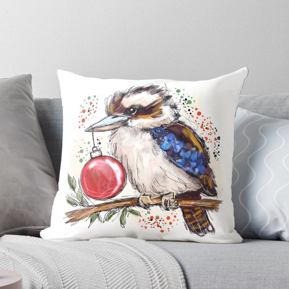 Colorful Christmas-themed pillow featuring a kookaburra, an iconic Australian native bird, designed by artist Tracey Mackie.