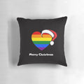 Colorful holiday pillow with rainbow hearts and a gay Santa design