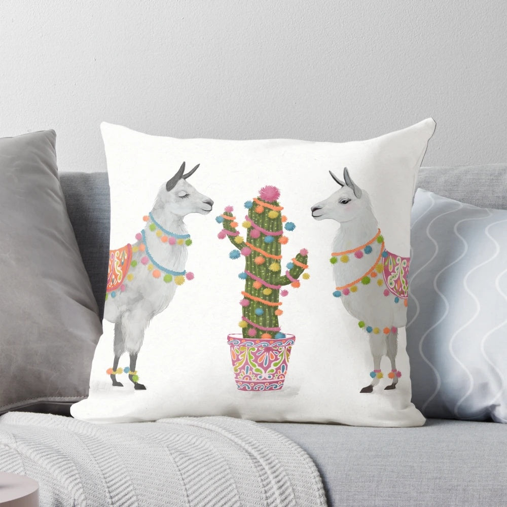A colorful pillow featuring a vibrant llama illustration against a southwest-inspired pattern.
