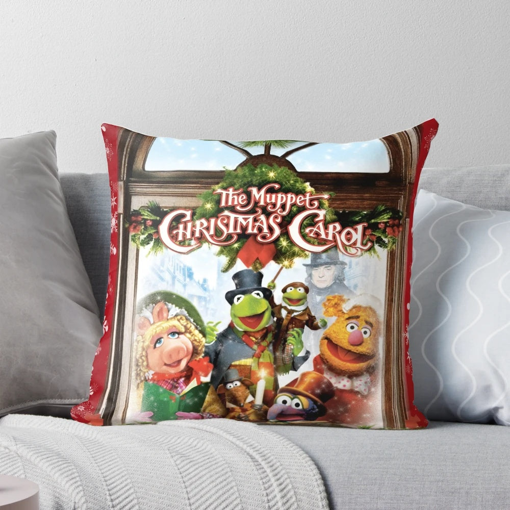 Muppet Christmas Carol-themed holiday pillow with Kermit the Frog, Miss Piggy, and other beloved Muppet characters.