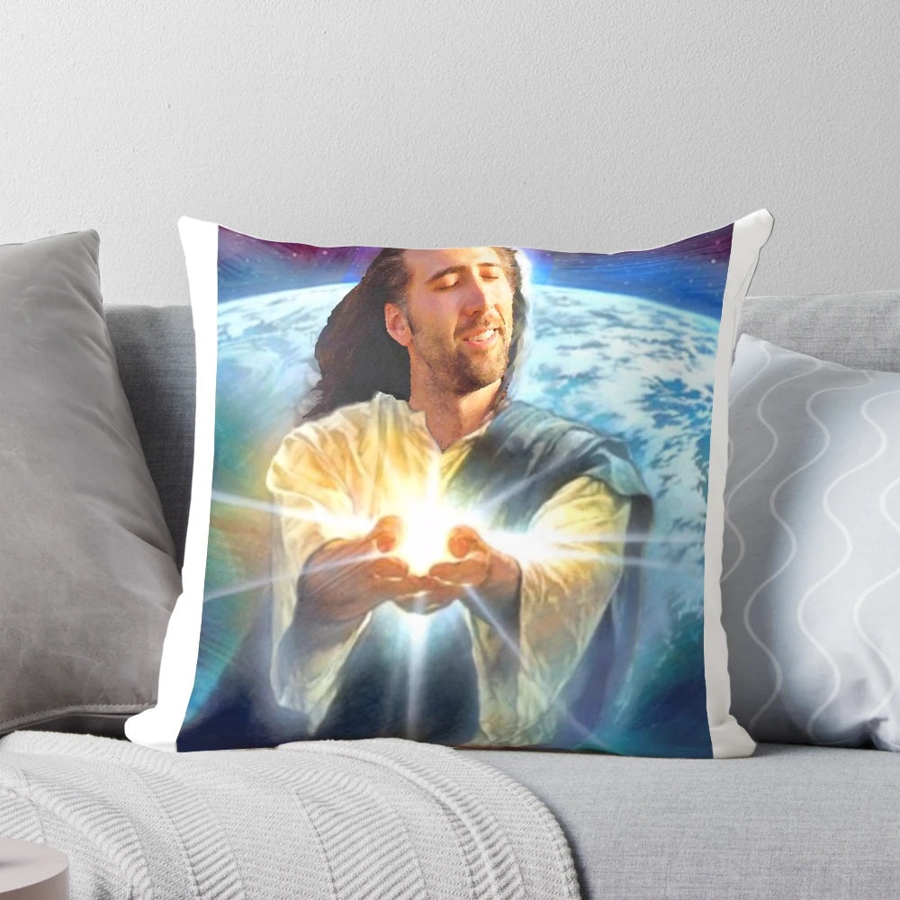 A decorative pillow featuring a parody image of Nicolas Cage's face overlaid with Christian imagery and text