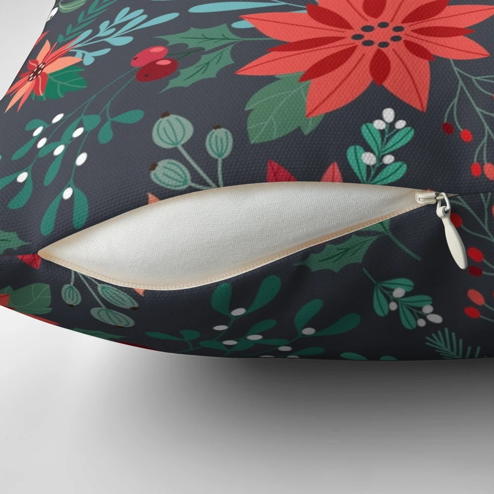Vibrant poinsettia floral pattern on a plush pillow for cozy holiday home decor