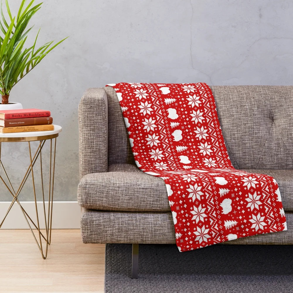 Pomeranian dog silhouettes on a red and white Christmas holiday pattern plush blanket