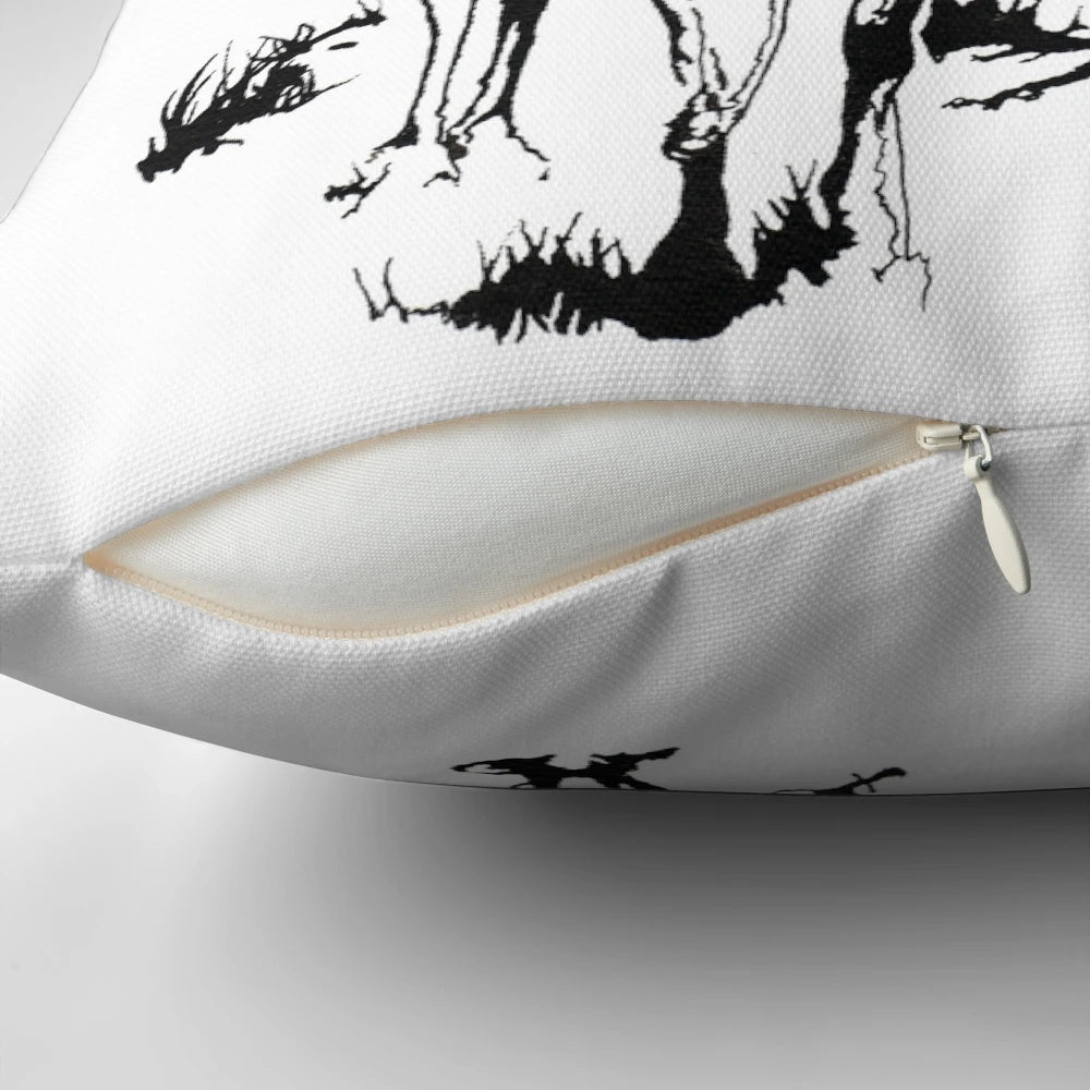 Decorative pillow featuring a hand-drawn reindeer with red and white mushrooms in a natural landscape